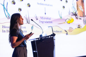 Dr. Jennifer Toyoda speaks about red tide mitigation science at the event Mote-ivational Mondays